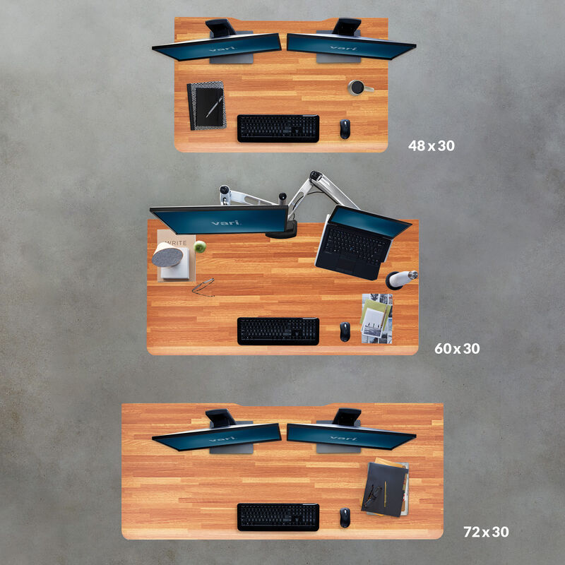 Overhead view of all sizes of Electric Standing Desk with ComfortEdge in Butcher Block image number null
